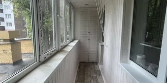 Внутренняя отделка балкона. Панели в ламинации. Установка шкафа.
